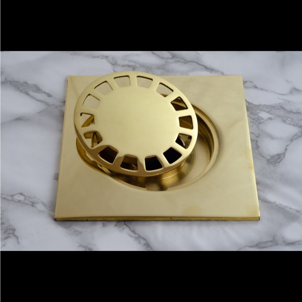 BRASSNA shower drain (featured by Architectural Digest and Leann Ford)